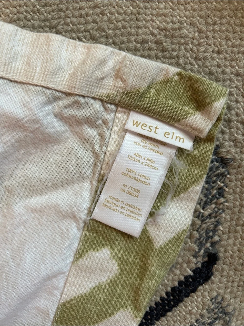 West Elm White Table Runner with Sage Green Interlocking Loop Pattern